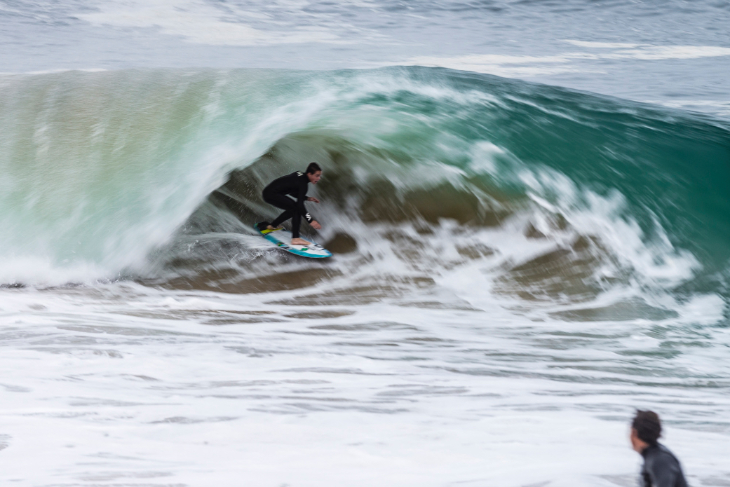 Tyler Gunter charging an inside section at the Wedge before lifeguards and police cleared the lineup due to the recent shark attack across the harbor in Corona Del Mar, not to mention the dead seal washing up. Photo: Ben Ginsberg