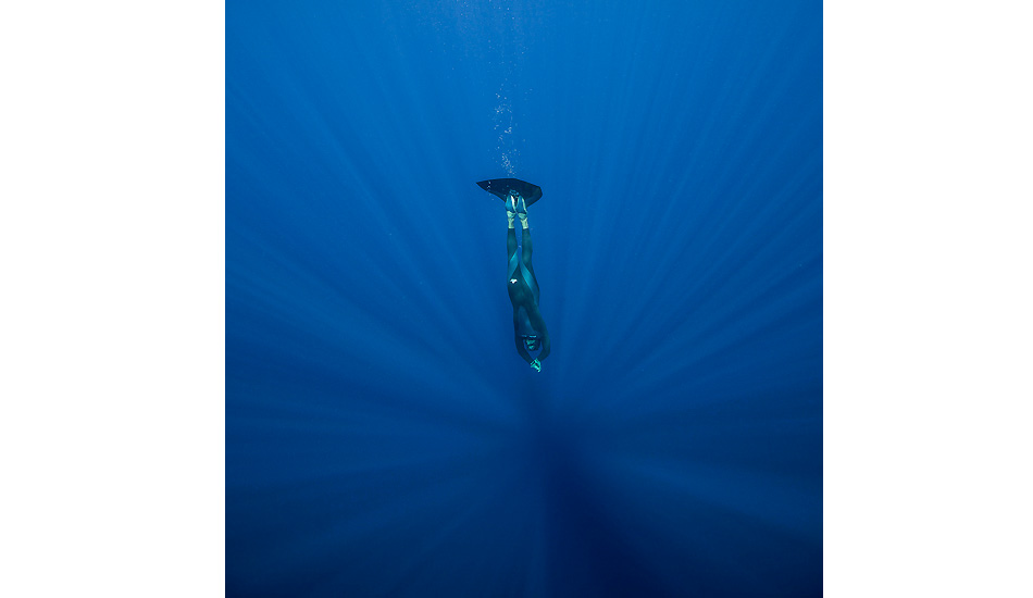 Freediving in the deep blue. Yoram Zekri, professional freediver, in Tahiti. Photo: <a href=\"https://benthouard.com/\" target=_blank>Ben Thouard</a>.