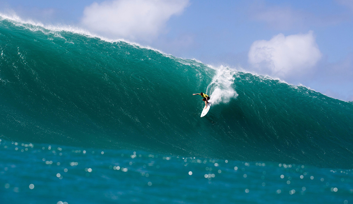 Grant Twiggy Baker of South Africa (pictured) holds his line during Round 2 of the Quiksilver In Memory of Eddie Aikua at Waimea Beach, North Shore, Hawaii on Thursday February 25, 2016. Photo: Keoki Saguibo