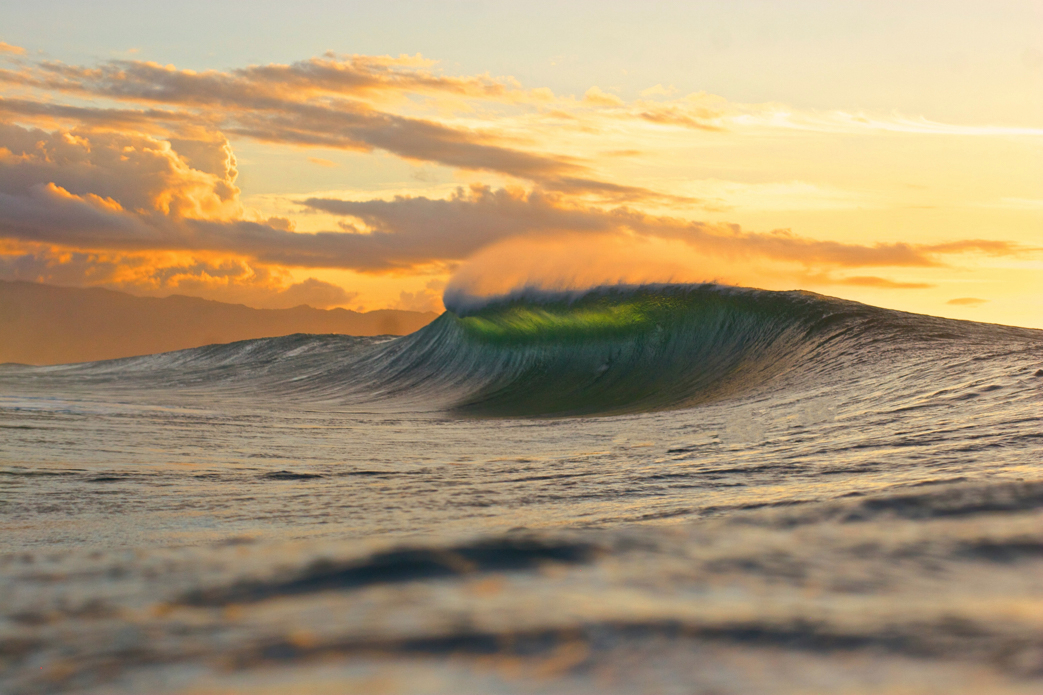 Golden hour at Pipeline—early season empty one. Photo: <a href=\"https://www.shigephoto.co/\">Gavin Shige</a>