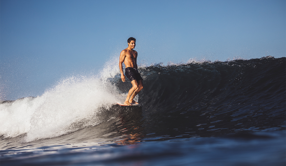 Cyrus Sutton trimming and grinning. Photo Sarah Lee