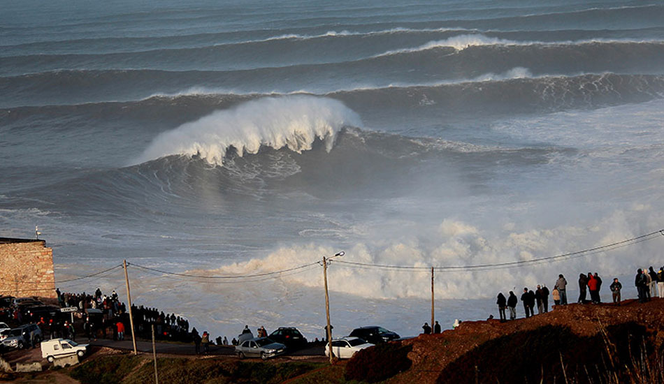 Enormous sets stretch back to the horizon. Photo: <a href=\"https://www.theinertia.com/author/jose-pinto/\">Jose Pinto</a> from <a href=\"https://www.theinertia.com/surf/winter-storm-brigid-batters-nazare-with-massive-swell/\" target=\"_blank\">Winter Storm Brigid Batters Nazaré with Massive Swell</a>