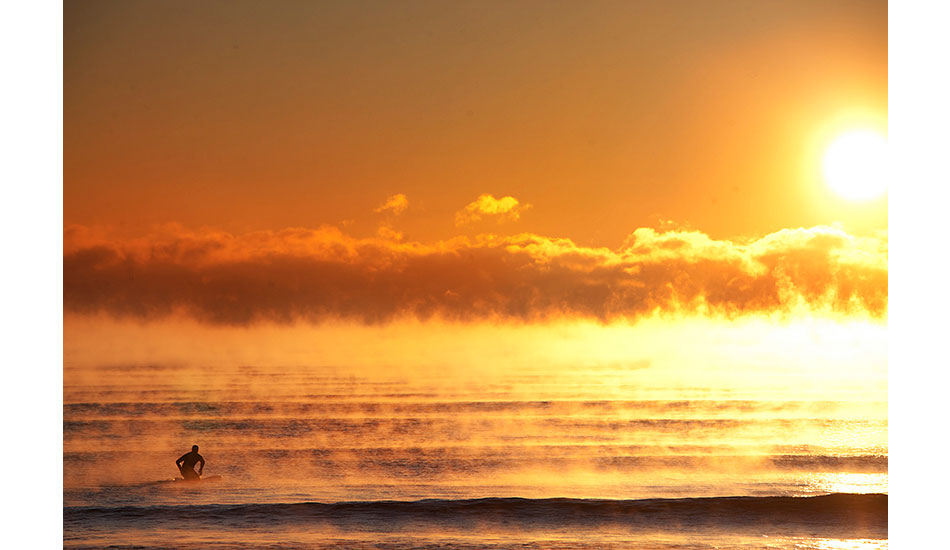Bryan Johnson gets a solo session in on a below zero morning. That\'s seasmoke on the surface caused by frigid temps hitting the high-30 water temps. Photo: <a href=\"https://www.briannevins.com/\" target=\"_blank\">Brian Nevins</a>