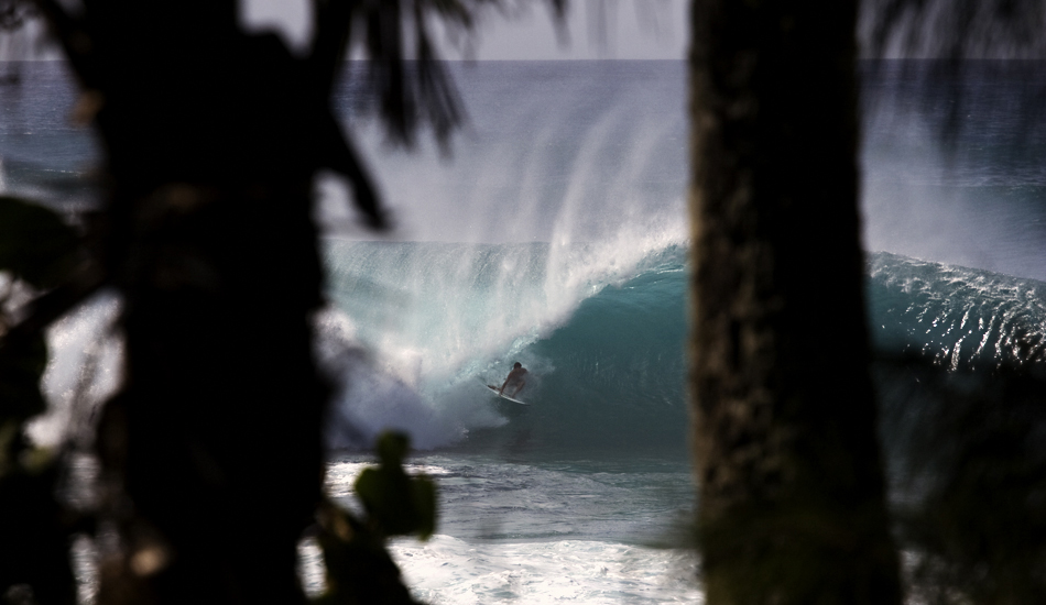 This is another shot from Pipe. I tried to find some different ways to photograph what everybody was seeing from the sand, just not to fall into the \"sameness\". Bruce Irons in the Backdoor Shootout contest. Image: <a href=\"https://www.luizblanco.com/Home.html\" target=\"_blank\">Blanco</a>