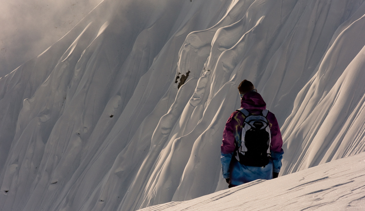 Gigi Rüf watching the first rays of light hit Birthday Bowl while planning his line. Photo: <a href=\"https://deanblottogray.com/\">Blotto</a>