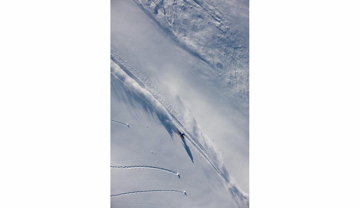 Finnish snowboarder Jussi Oksanen is a long way from the 500 vertical foot mountains he grew up on in Scandinavia, now it’s 500 feet covered every few seconds! Photo: <a href=\"https://deanblottogray.com/\">Blotto</a>