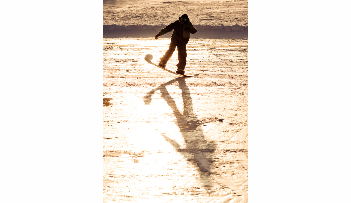 Nicolas Müller messing around with a snowball prior to lift off into the tall mountains. Photo: <a href=\"https://deanblottogray.com/\">Blotto</a>