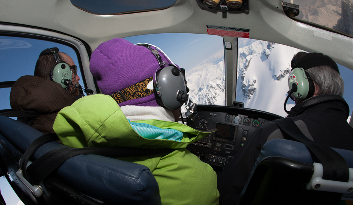 Guide, rider and pilot plotting the next landing zone. Guide: Ted Purdy Rider: Kevin Pearce Pilot: Al Holzman Photo: <a href=\"https://deanblottogray.com/\">Blotto</a>