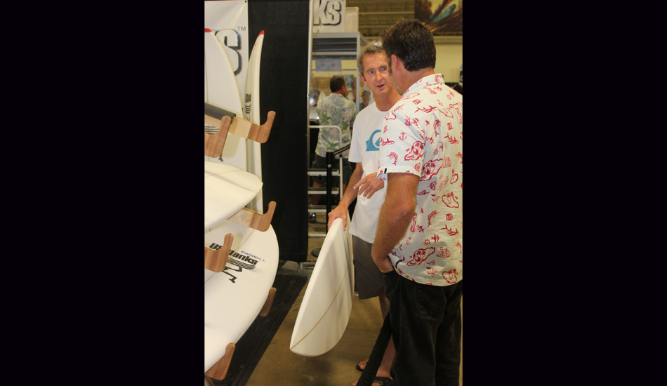 MR taking a look at some of the boards shaped in the contest honoring him and discussing the finer points of shaping with Matt Biolos. Photo: Green