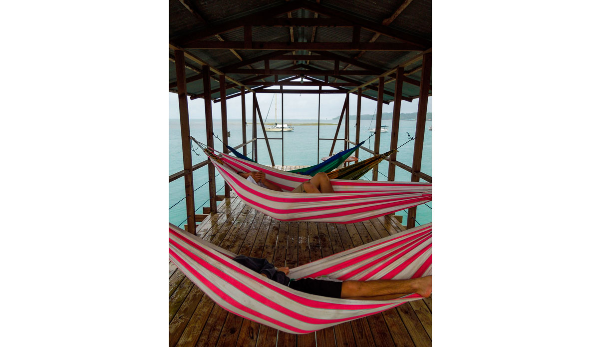 When it rained, we snored. The boys take a quick snooze as we waited out a warm tropical rainstorm.  Photo: <a href=\"https://www.facebook.com/ColinRothPhoto\"> Colin Roth</a>