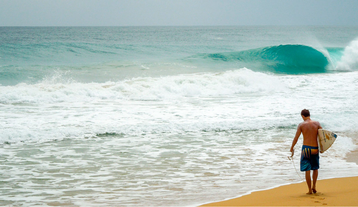 Kai Rogers (@kai_rogers) walking back to an empty lineup, probably very glad he didn\'t go to Cabo. Photo: <a href=\"https://www.facebook.com/ColinRothPhoto\"> Colin Roth</a>