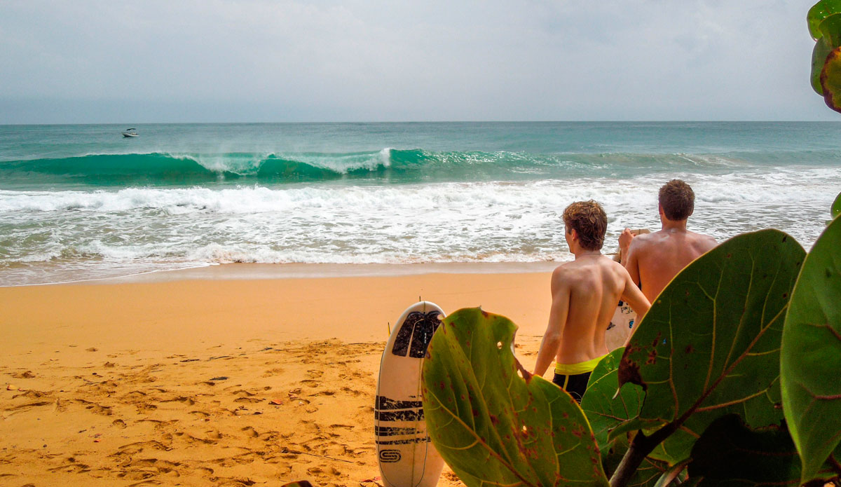 Tyler Correll (@tylerwcorrell) and Kai Rogers (@kai_rogers) taking a quick break deciding which way they would have gone. Our trusty vessel lies offshore. Photo: <a href=\"https://www.facebook.com/ColinRothPhoto\"> Colin Roth</a>