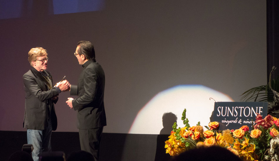 Robert had specifically requested that Roger Durling, Executive Director of the festival, be the one who gives the American Riviera Award. Roger was deeply honored and made him feel a deep level of influential importance. Photo: <a href=\"https://lowtiderising.com/\" target=_blank>Branden Aroyan/lowtiderising.com</a>