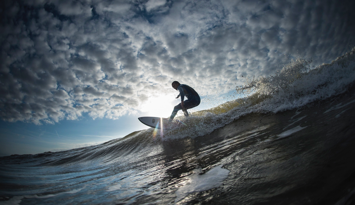 Turning sun. Jeroen Veen at The Spot in Zandvoort, Netherlands. Photo: <a href=\"https://www.thesurfoffice.com/blog/2014/11/27/brendan-it-director-surf-photographer\"> Brendan Bank</a>