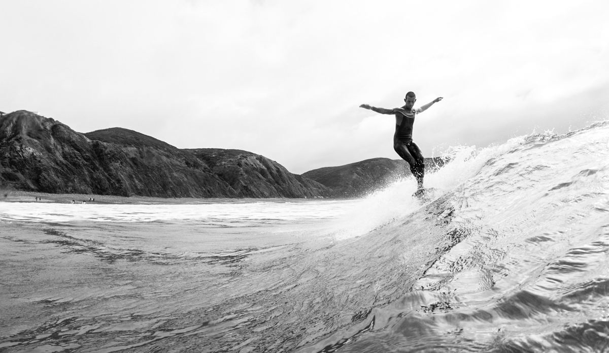 Luis Esteves hanging 10 in Arrifana, Portugal. Photo: <a href=\"https://www.thesurfoffice.com/blog/2014/11/27/brendan-it-director-surf-photographer\"> Brendan Bank</a>