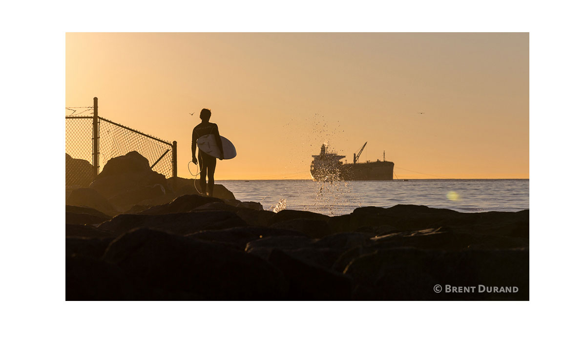 Waiting for the perfect time to enter the water from a jetty in Los Angeles. Photo: <a href=\"https://instagram.com/brentdurand\">Brent Durand</a>
