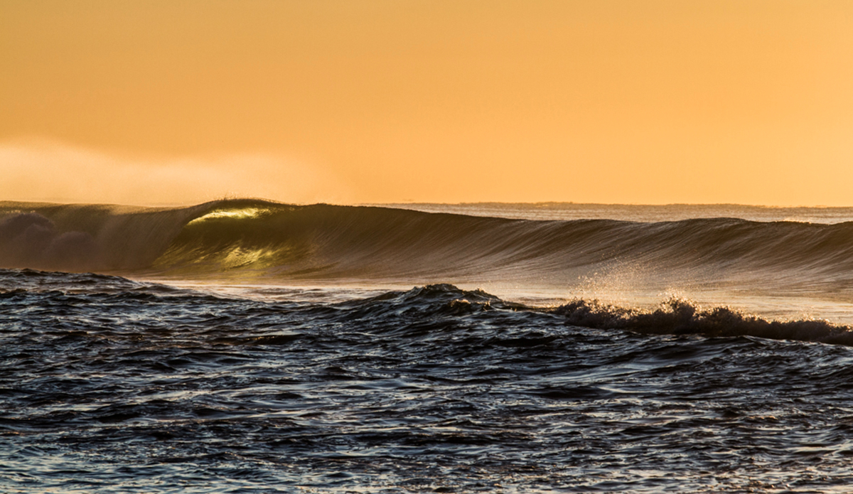 Morning barrels tinted in the harsh morning sun. Photo: <a href=\"https://brentonderooy.com/\">Brenton de Rooy</a>