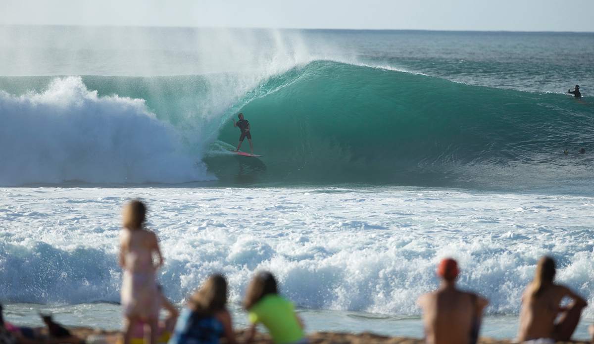 Jamie O. casual as can be while the crowd on the beach watches.