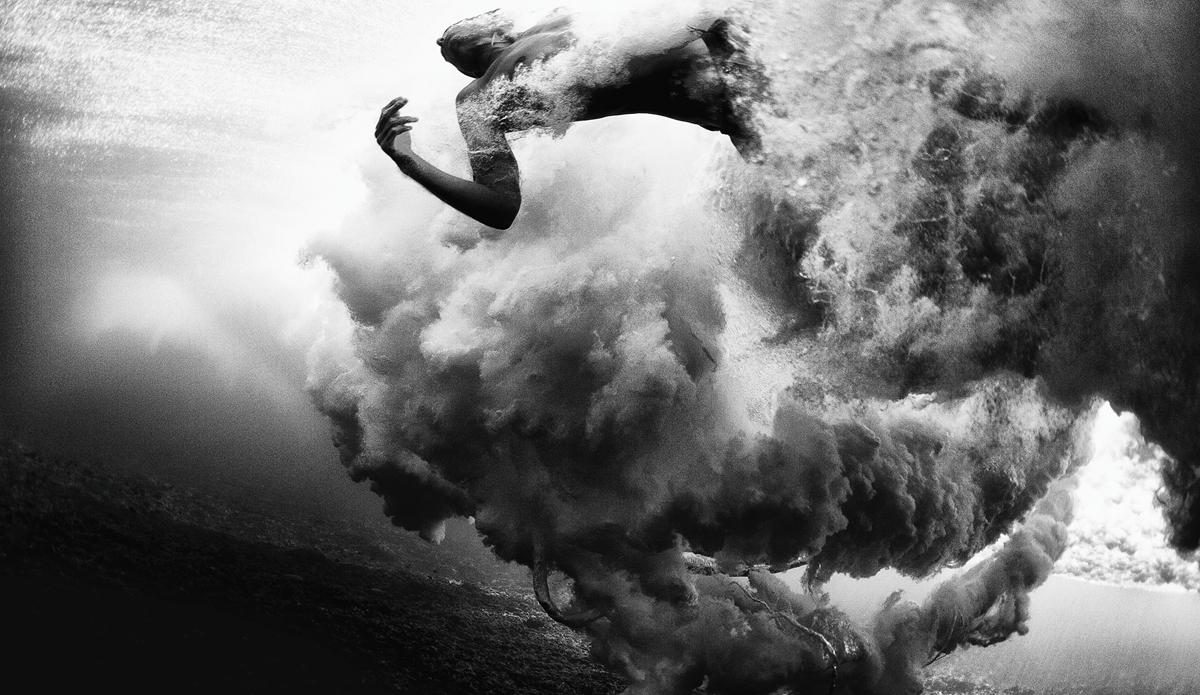 One of my favorite images underwater. I made eye contact as he penetrated this wave while wiping out. Just after he was sucked back through the wave.