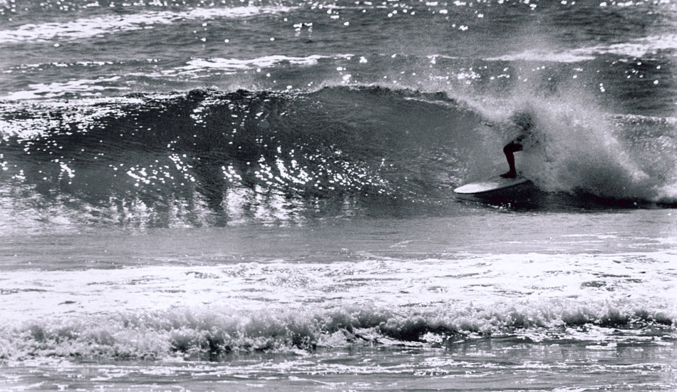 Peter Hughes, body dip 1965 - Every beach had a shooting star. Peter Hughes’ star shone brightly from 1958 until increasingly becoming a mystery sighting towards the late sixties. He later surfaced on the Sunshine Coast. Photographed during a Seabeach v Peninsula Contest early 1965. Photo: <a href=\" www.bruceusher.com.au\">Bruce Usher</a>