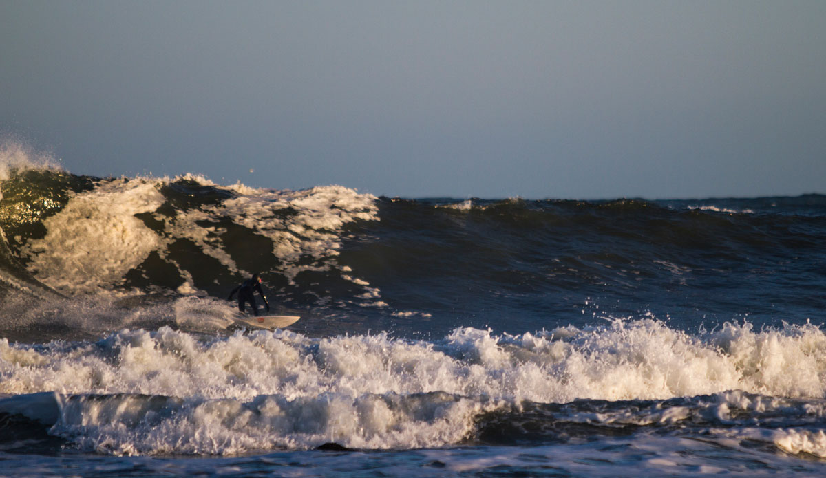 Joel Feid in some solid storm surf. Photo: <a href=\"http://www.bryannicholson.com/\">Bryan Nicholson</a>