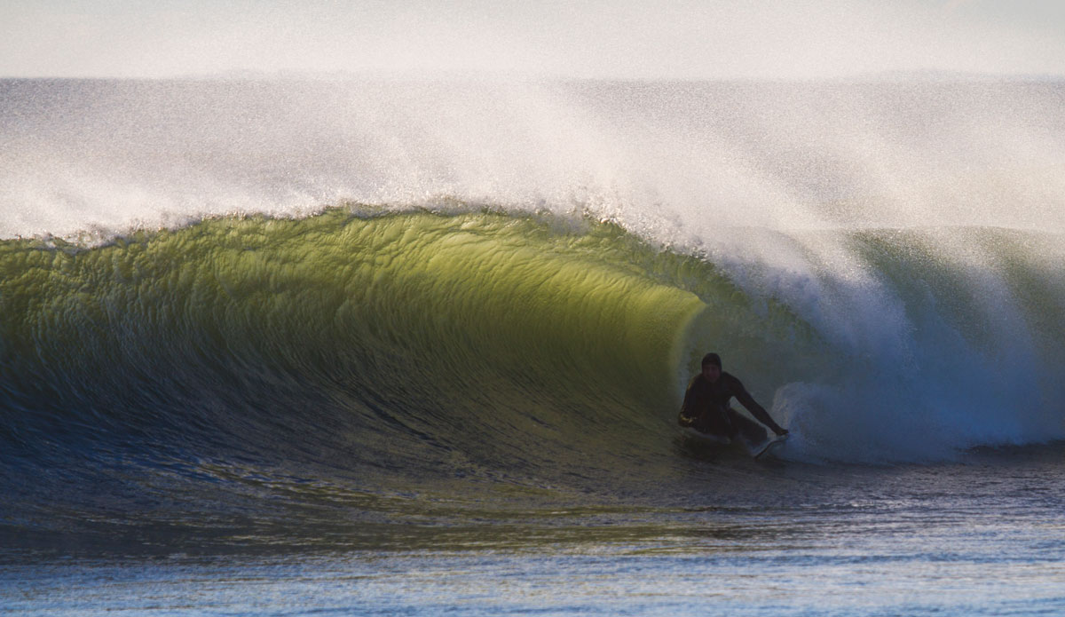 Joel Feid tucking into a green right. Photo: <a href=\"https://www.bryannicholson.com/\">Bryan Nicholson</a>