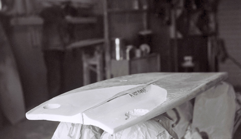 Here is that same surfboard after a few hours of reconstructive surgery with master glasser Paul Jeggles is hard at work in the background. Photo: <a href=\"https://expressionsaufrichtig.tumblr.com\">Jared Aufrichtig</a>