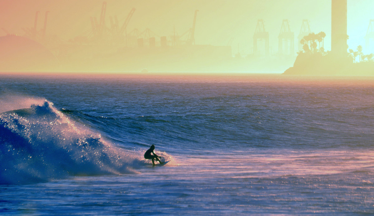 In the background you can make out the top of the dome of Queen Mary and Oil Island. The Surfrider Foundation has been fighting an uphill battle for many years to restore the shore and bring much needed waves back to Long Beach. Photo: Wes Harding