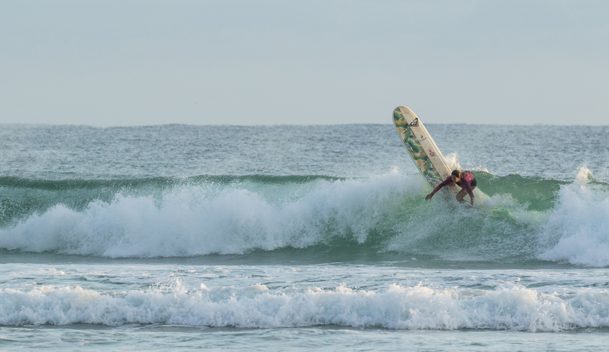 Kingscliff Beach in Australia. This was taken during my warm-up session before the contest at the Australian Longboard Surfing Open, the first event in the World Longboard Qualifying Series in 2016. I happily came home with the win, celebrating such a great trip to Australia. Nowadays, with the evolution of material and shapes in the surfboard industry, we can have lighter longboards like never before, and it allows the surfer to perform beyond the expectations of riding a longboard. While longboarding will always have its traditional roots, the new ages show that classic style can be mixed with some tail surfing, making the surfer use the entire length of the board. Photo: Andrew Carruthers 
