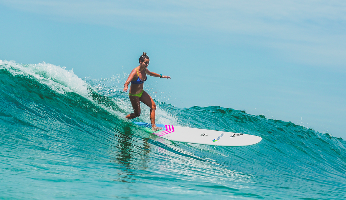 At Macumba Beach in Rio de Janeiro. This is one of my favorite moves—the drop knee turn. Switching your front knee to change the direction on a wave. I grew up surfing beach breaks, and Macumba Beach is one of the most iconic longboard spots in Brazil. It\'s still my favorite spot to surf. Even though it\'s a mellow wave, it\'s the best in town for a log, kinda bumpy and with some tricky sections. It ain\'t a wave to ride a the heavy single fins like in California, so I have to adapt my traditional single fins for this kind of wave. Photo: Fellipe Ditadi