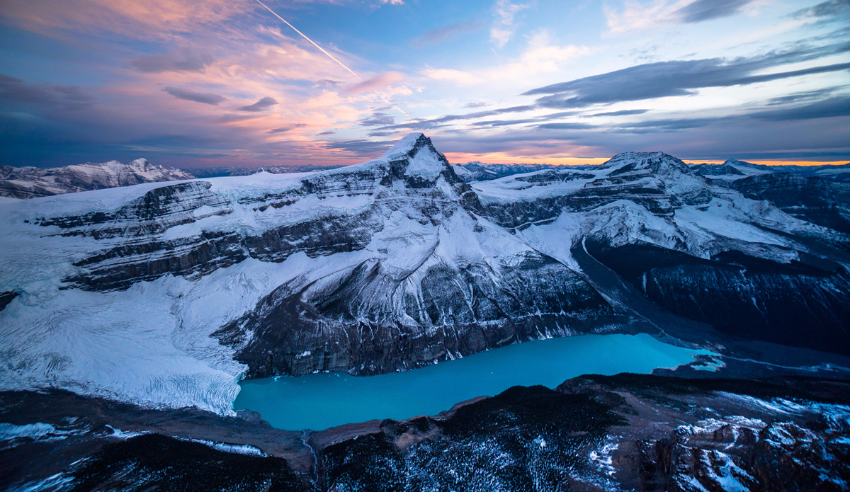 Alberta, Canada makes you feel small. One of the best ways to see this amazing landscape is from the air. Here, the sun sets over this beautiful alpine canvas. Photo: <a href=\"https://instagram.com/chrisburkard/\">Chris Burkard</a> [See the post on <a href=\"https://instagram.com/p/3Cc1oTq9VC/?taken-by=theinertiamtn\">Instagram</a>.]
