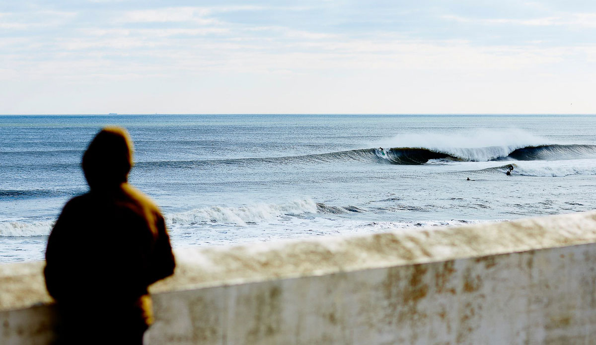 This guy kept trying to get out of my shot. Luckily, he stayed still just long enough to balance the composition for the bomb coming in. Photo: <a href=\"https://www.chrisdelorenzophoto.com/\"> Chris DeLorenzo</a>