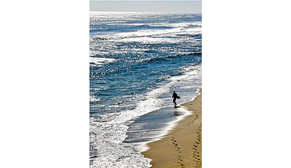 Birdseye View: OBX 2011. If you live on or near the OBX, you know any given storm can severely impact your day to day routine. This image was captured from the deck of a home that now rests in the bottom of the Atlantic. Photo: <a href=\"https://www.chrisfrickphotography.com/\" target=_blank>Chris Frick</a>.
