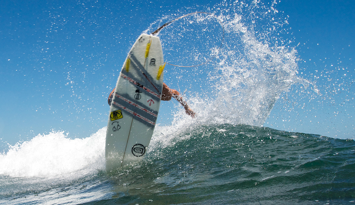 A young Puerto Rican native and professional surfer, \"the chi elf\" himself, Hector Santamaria - such a style master it was always awesome to shoot with him. Photo: Chrissy Swain