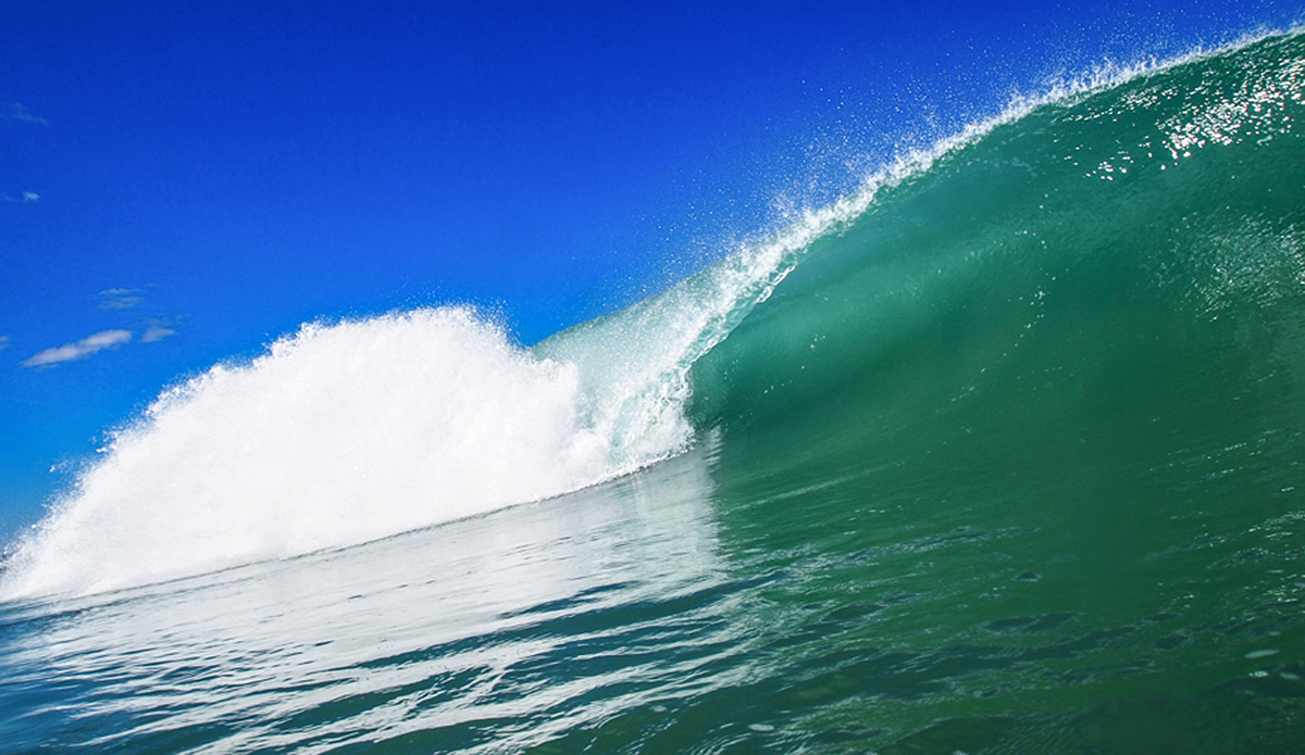 Clean Caribbean barrel you can see the wave spitting which is why I like this shot, it also looks good on a wall. Photo: Chrissy Swain