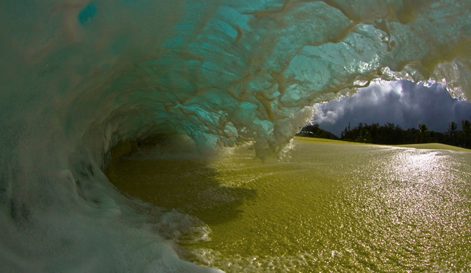 I really enjoy the lighting in this shot with the storm clouds in the background of this \"Insanities\" shore break. Photo: <a href=\"https://www.christianlacuestaphotography.com\"> Christian LaCuesta</a>.