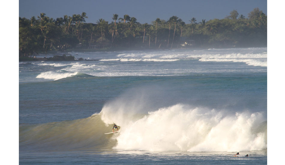 Here\'s Ned Snow pulling into a cave. He actually grew up in that house in the background, though he looks right at home on this wave as well. Photo: <a href=\"https://www.christianlacuestaphotography.com\"> Christian LaCuesta</a>.