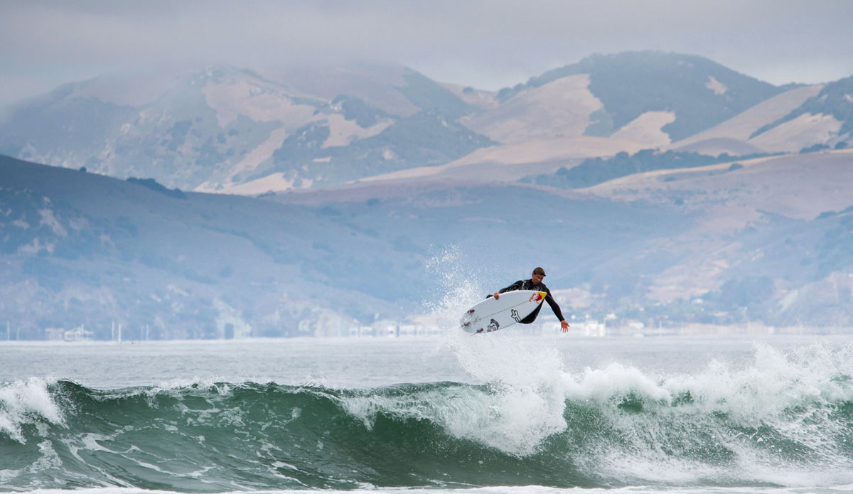 Ian Walsh taking flight on the west coast. Photo: <a href=\"https://www.colinnearman.com\">Colin Nearman</a>