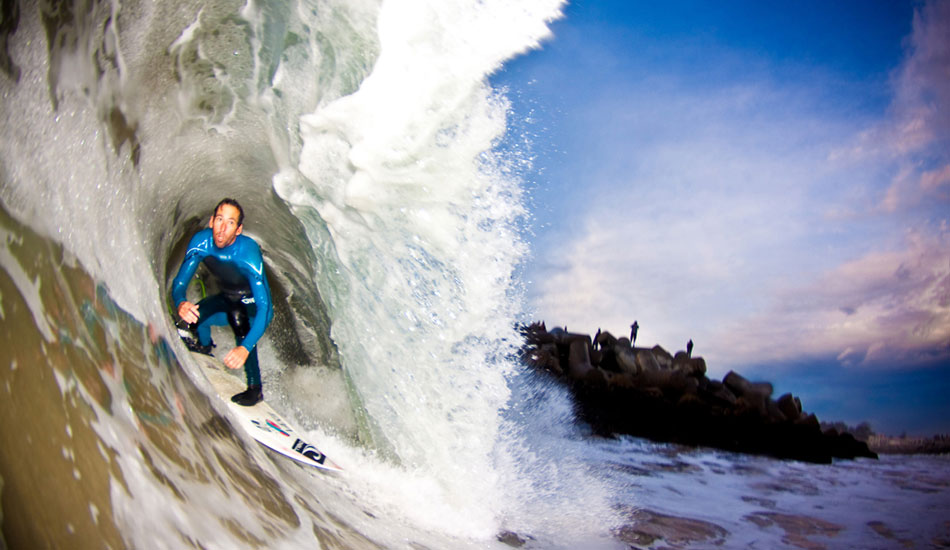 The lip is so thick at the Harbor mouth that flash is sometimes the only way to light up the surfers.  Mid barrel, Ratboy eyes the exit. Photo:<a href=\"https://www.ryancraigphotography.com\" target=_blank>Ryan Craig</a>