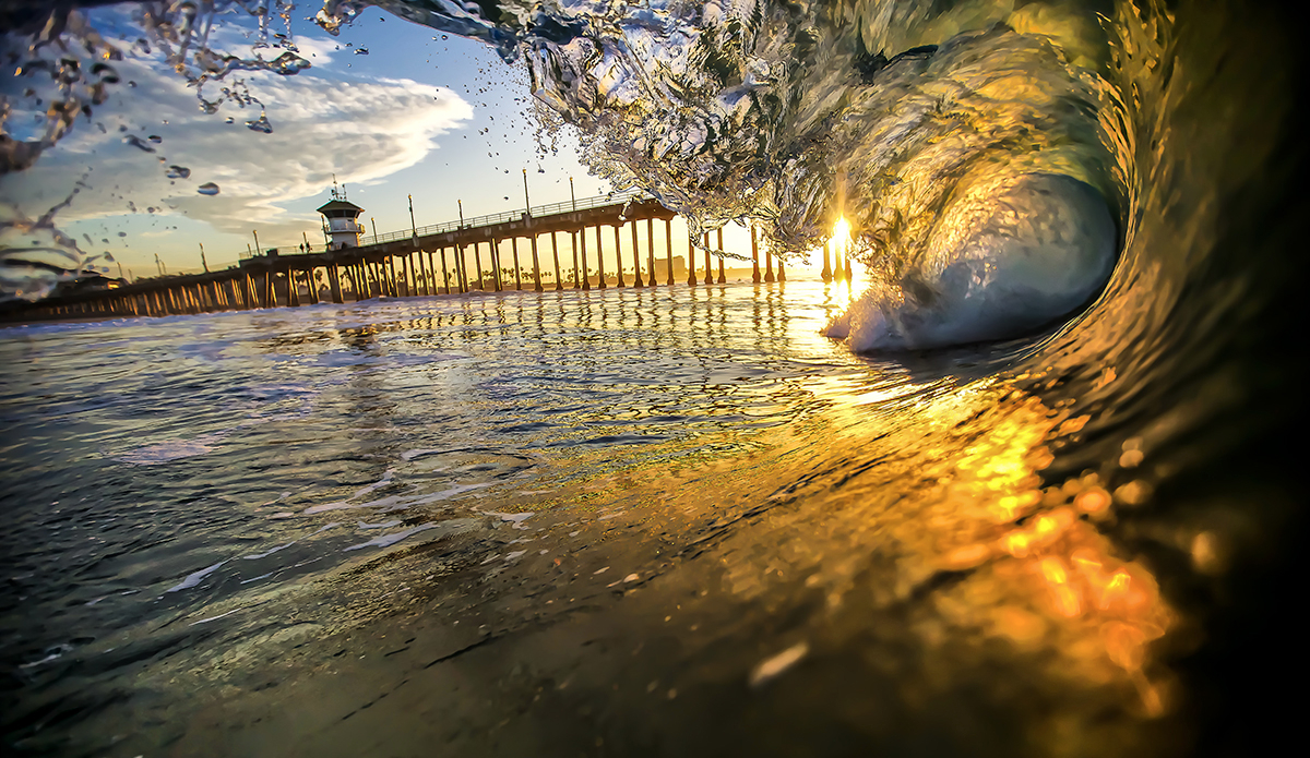 Huntington Beach sunburst sunrise. Photo: <a href=\"https://craiglarsonimaging.com/\">Craig Larson</a>