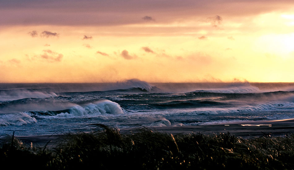 Sometimes people actually forget that we live on a planet just floating around in outer space. I like this shot because it kind of reminds me of that. The beach grass in the foreground is actually frozen solid even though the sun is burning radiantly more than 90 million miles away. Photo: <a href=\"https://reddawnproductions.net/\" target=_blank>Evan Conway</a>.