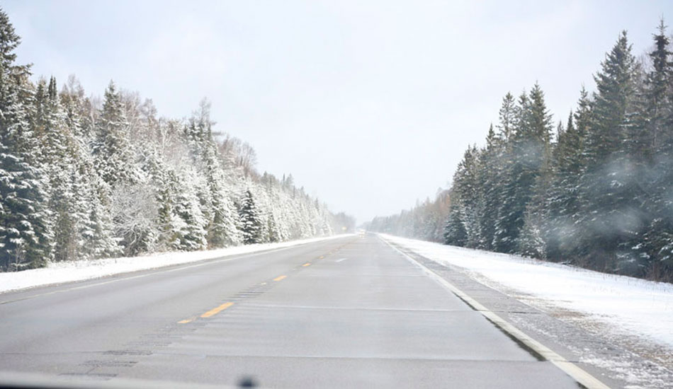 Great Lake surfers have a very different view on their way to a session. Photo: <a href=\"https://www.mikekillion.com/\" target=_blank>Mike Killion.</a>