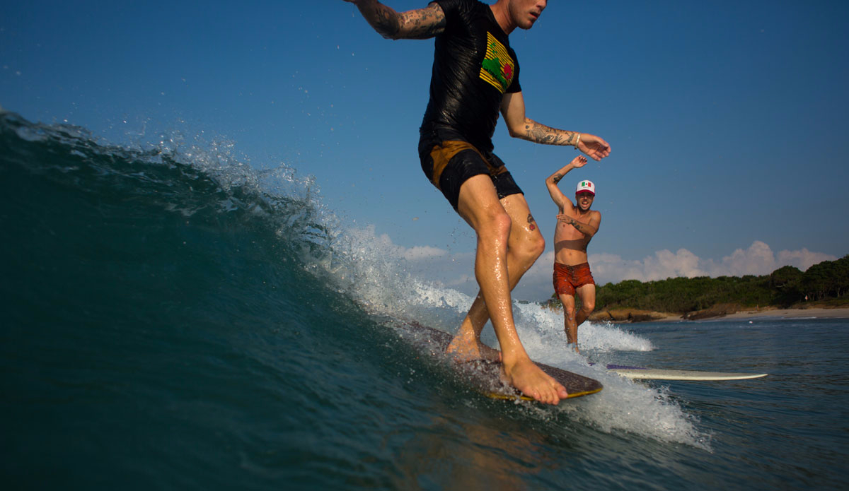 Colin Whitbread and Dane Peterson party waving. Photo: Soens