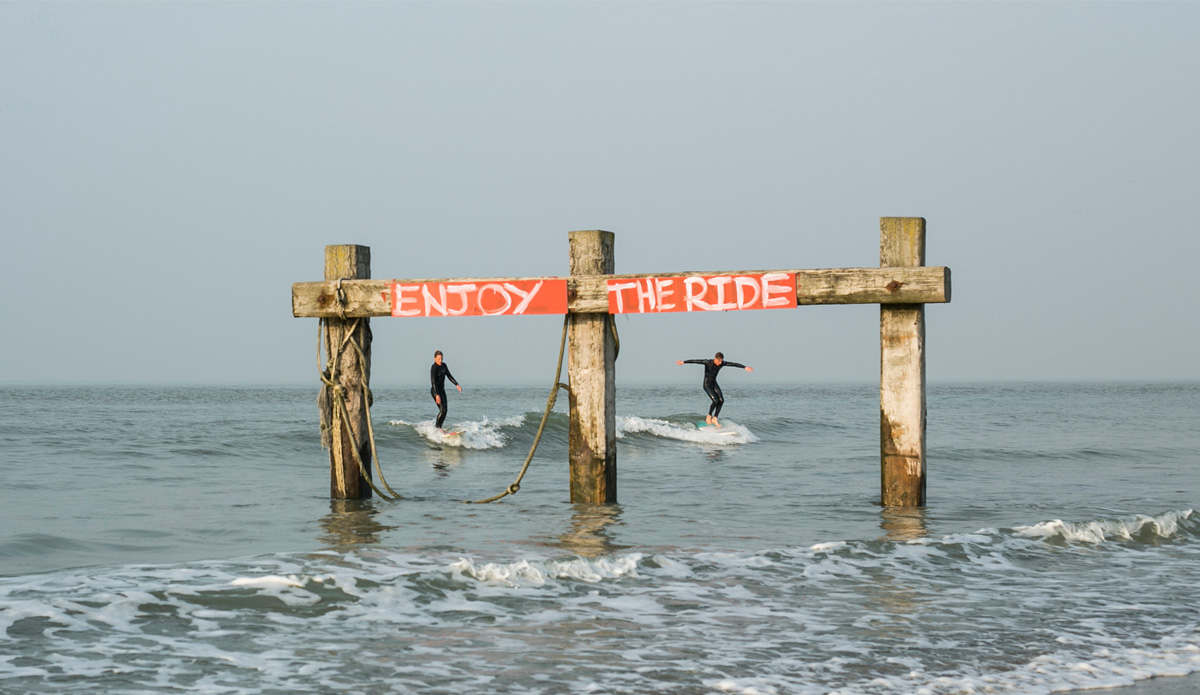 I shot this one the first day I went to check out this spot. It was really glassy and sunny, lighting was awesome! This is one of Ostend\'s main breaks. This day was small as you can see, but still it was really amazing for me just being there. I saw this thing in the water with a sign that said \"Enjoy the Ride.\" It made me realize that no mater what you ride, the size of waves or conditions... just  ENJOY THE RIDE. Photo: Damian Davila