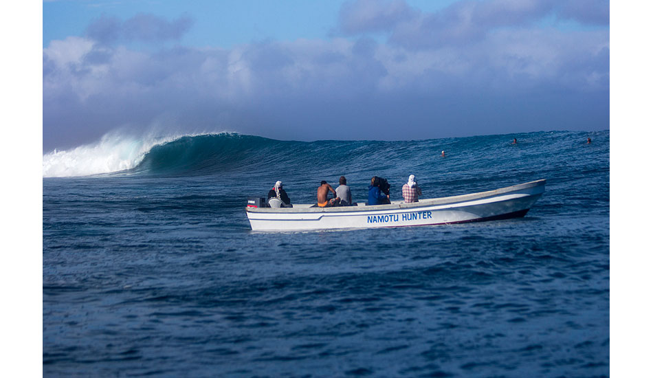 Just an empty at Cloudbreak with the boat from Namotu watching. Photo: <a href=\"https://www.davenilsenphotography.com/\">Dave Nilsen</a>