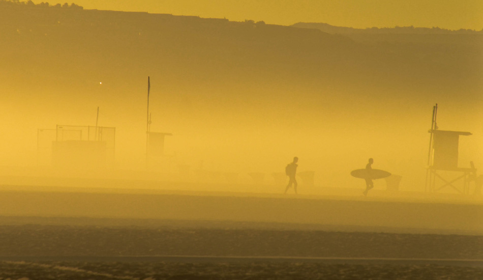 Gold Dust - The golden marine layer joins these two as they walk to the sea. Photo: David Zymkowitz