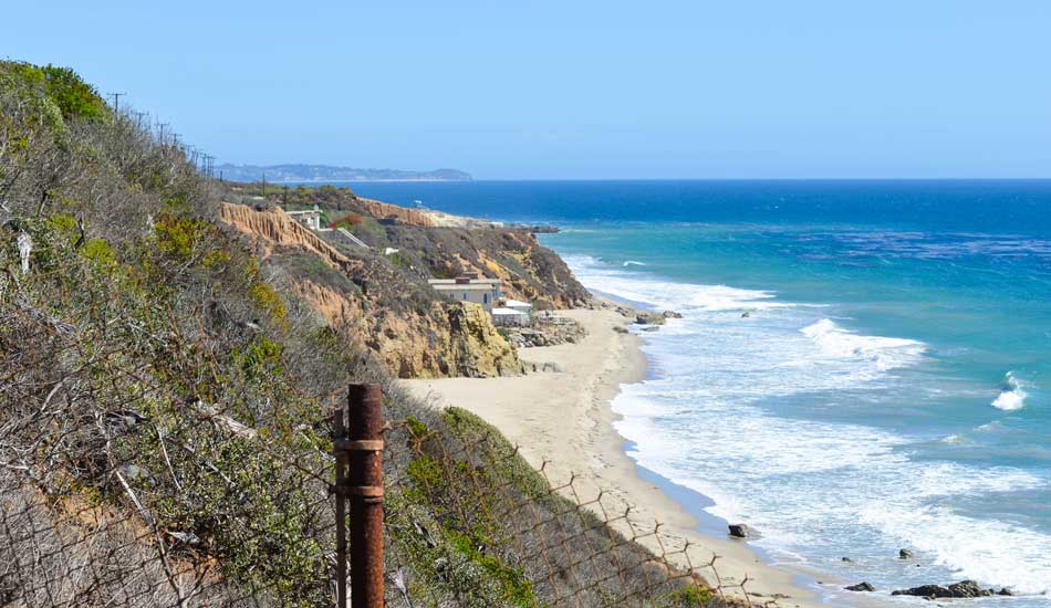Private Sand - Fences and signs seem to do little to stop the LA county locals from surfing their favorite spot. Photo: David Zymkowitz