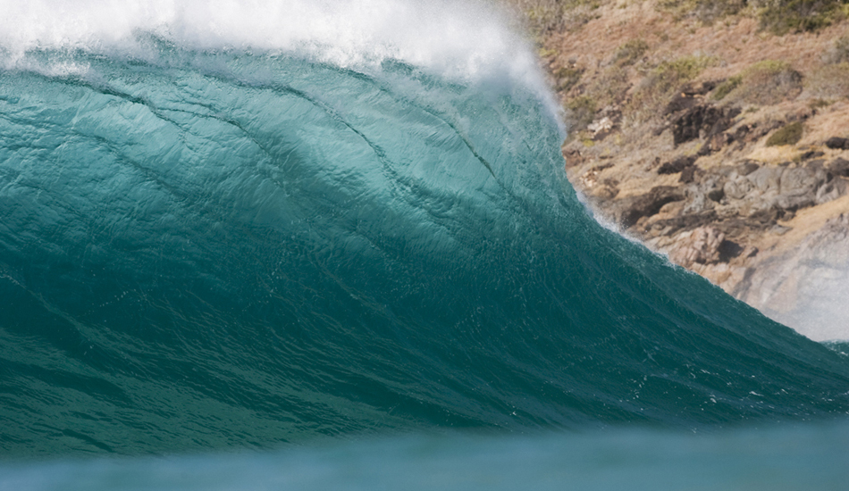 NSW. This wedging right hander breaks on sand, and only happens when the bank is just so, with sand heaped in the corner of the headland. When it is on though, it can get crowded, as everyone in the area wants a crack at nabbing one like this. Image: <a href=\"https://www.sparkesphoto.com\" target=\"_blank\">Sparkes</a>
