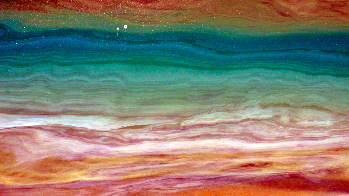 The Abstract of miniature waves can be quite effective. This is the face of a six inch wave reflecting the colours of a rainbow. Photo: <a href=\"http://debmwaveart.webs.com/\">Deb Morris</a>