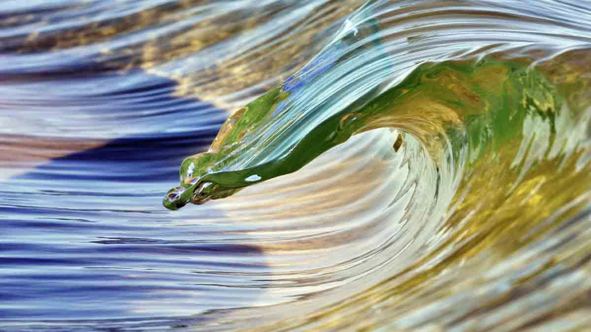 The It is always a pleasure to discover a new sand bar; the platform for water sculptures. This particular morning the conditions were prime, no wind, decent swell and an incoming tide with opal colours shining through the sunlit wave. Photo: <a href=\"https://debmwaveart.webs.com/\">Deb Morris</a>